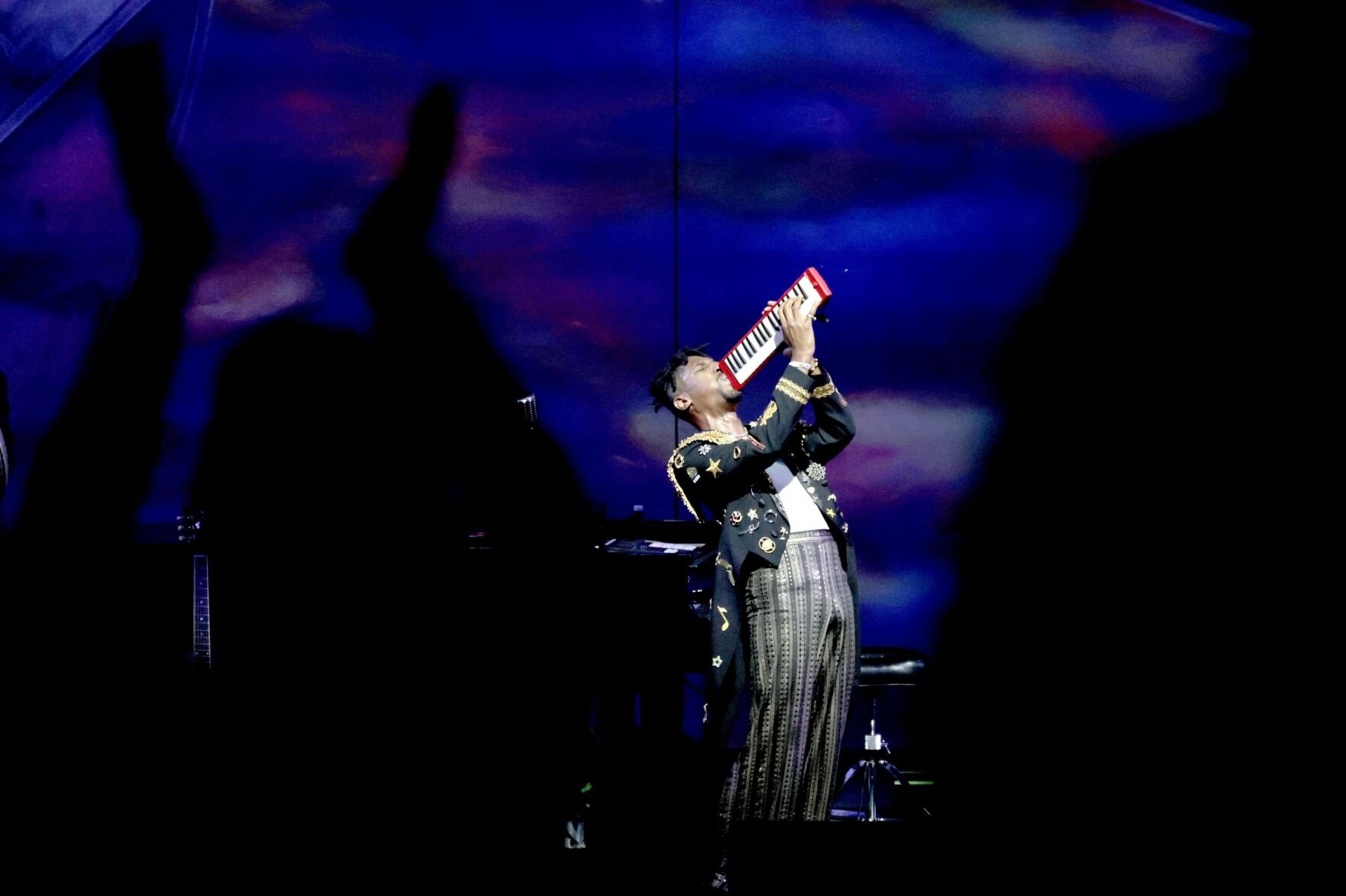 Jon Batiste performs at the Muny